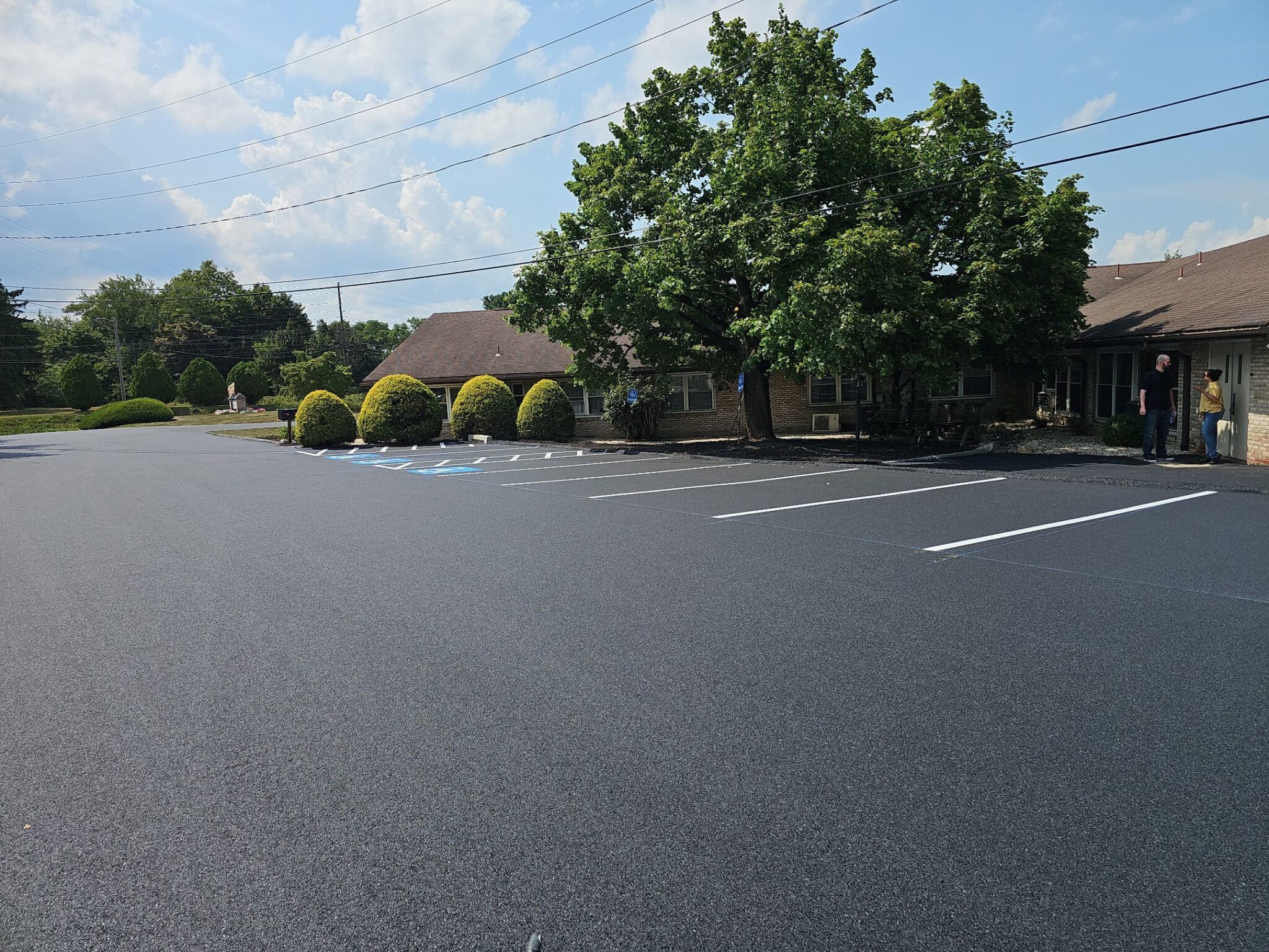 Parking lot for retirement home with clean, new line striping.