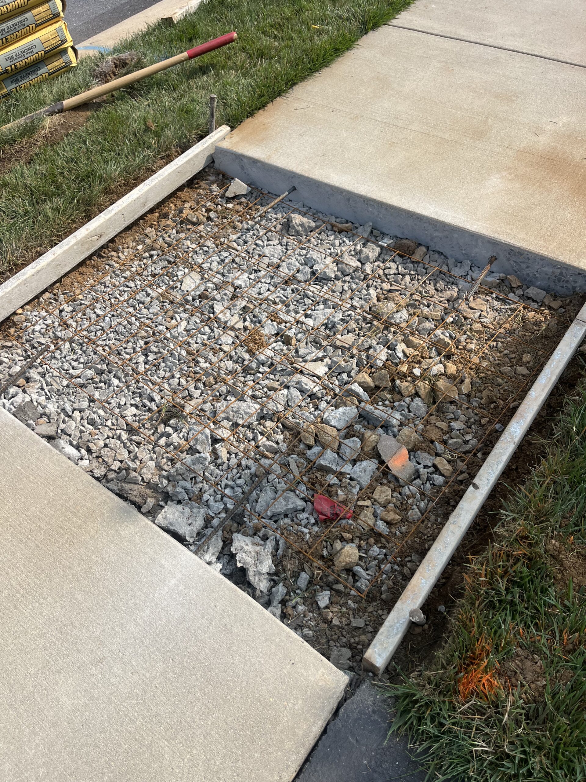 Formed concrete slab with rebar and mesh wiring.